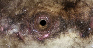 光弯曲引力揭示了迄今为止发现的最大黑洞之一